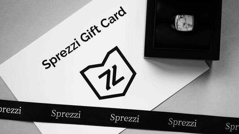 Sprezzi Gutschein in eleganter schwarzer Geschenkbox hochwertig verarbeitet Sprezzi Fashion