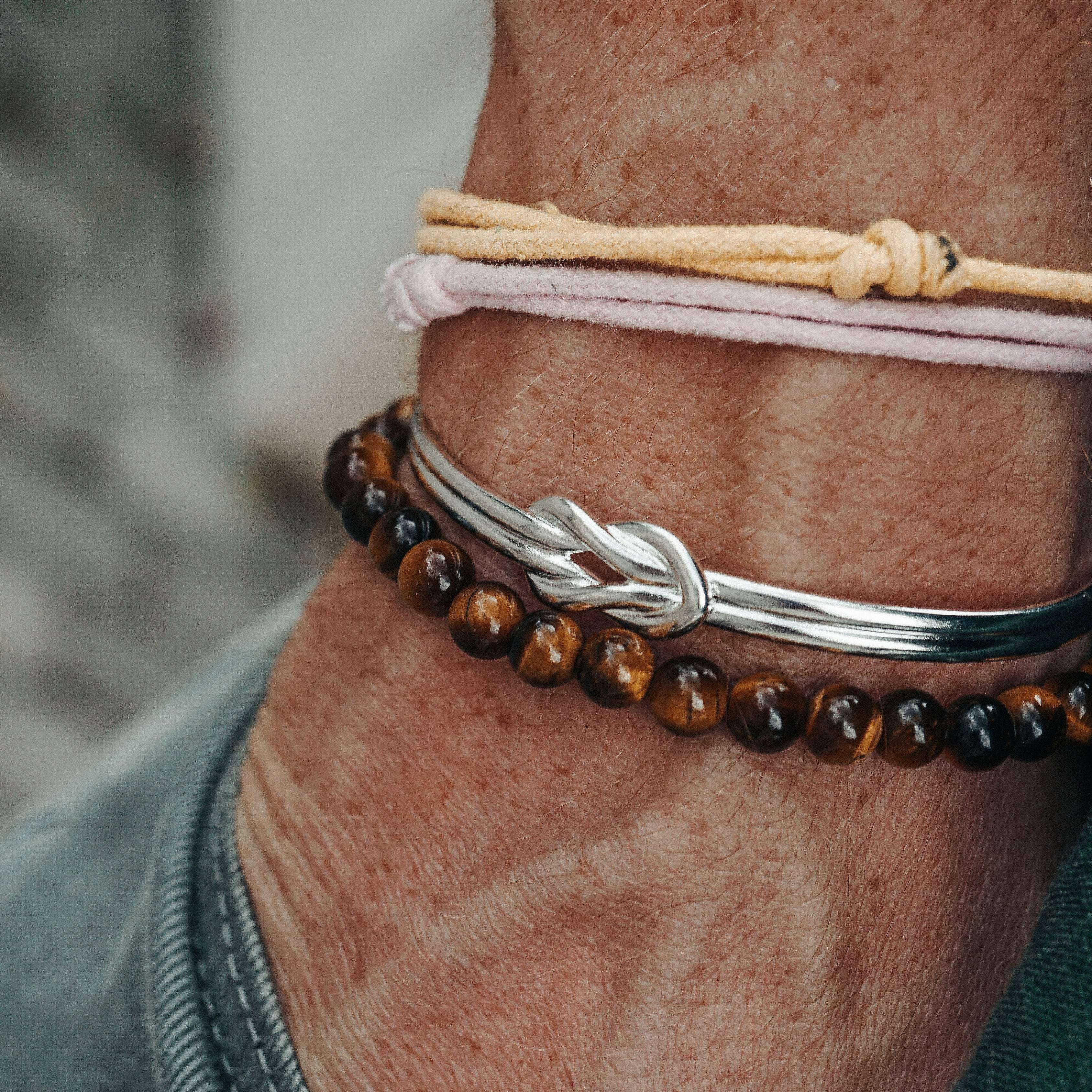 Fashionable bracelet for men made of brown stone beads